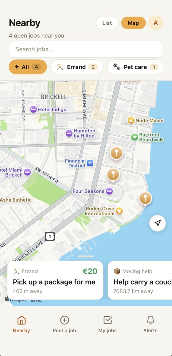 Nearby jobs shown as pins on a map, with category filters and job cards at the bottom
